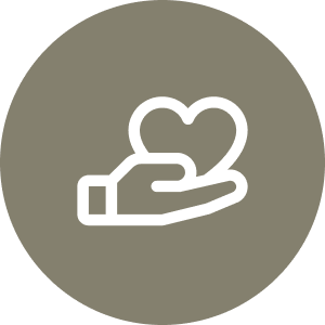 A white icon of a hand holding a heart is centered on a circular gray background.