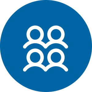 Icon of four stylized people represented by white outlines, arranged in two rows of two, against a solid blue circular background.