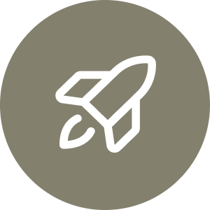 A white rocket icon on a gray circular background.