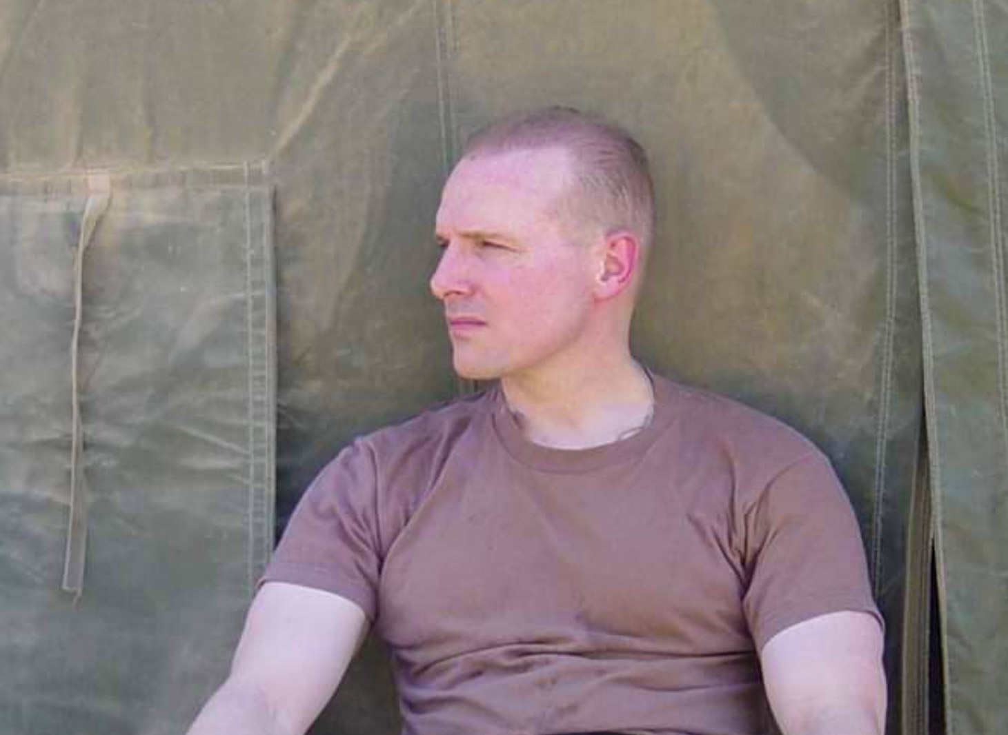 Photo of Wayne in the U.S. Army during an overseas deployment.